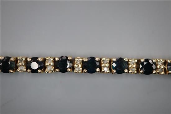 A 9k and sapphire set line bracelet, 18.5cm.